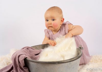 Séance bébé avec plaid